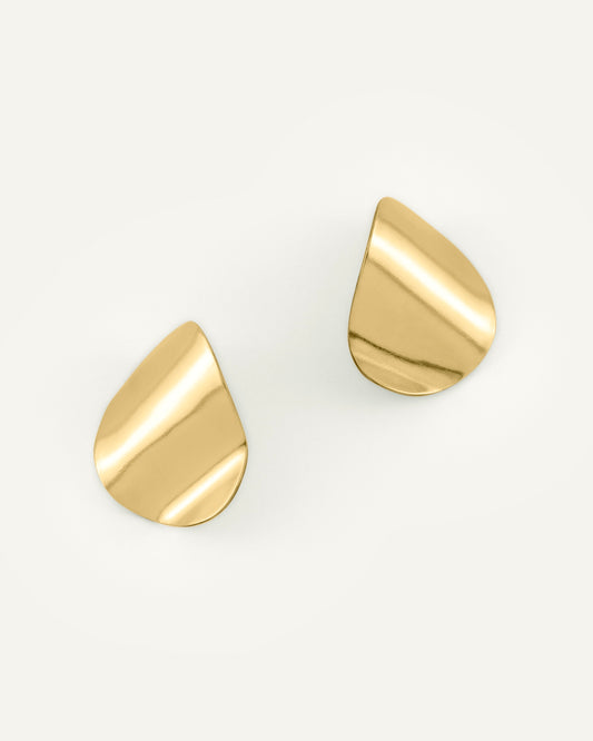 A pair of clean line, pebble-shaped brass earrings with high polished finish